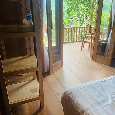Uma D'Nyuh Homestay Singaraja Extérieur photo