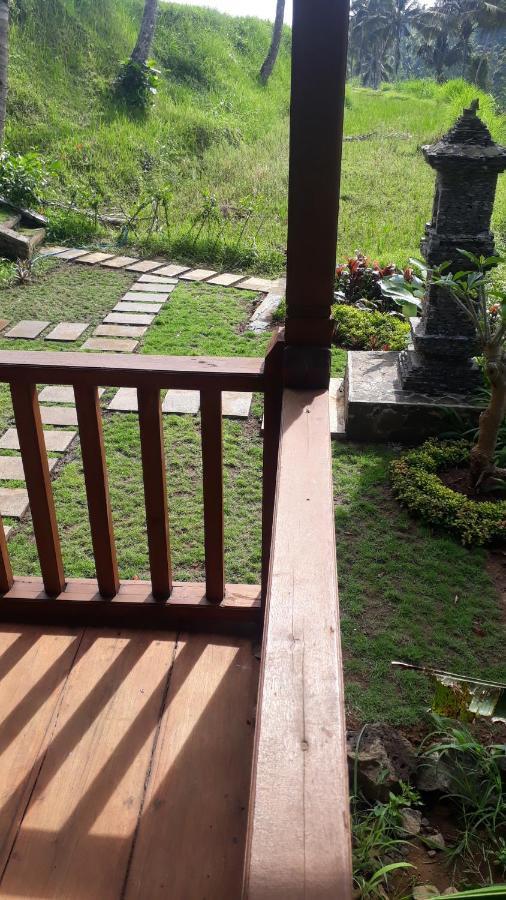 Uma D'Nyuh Homestay Singaraja Extérieur photo