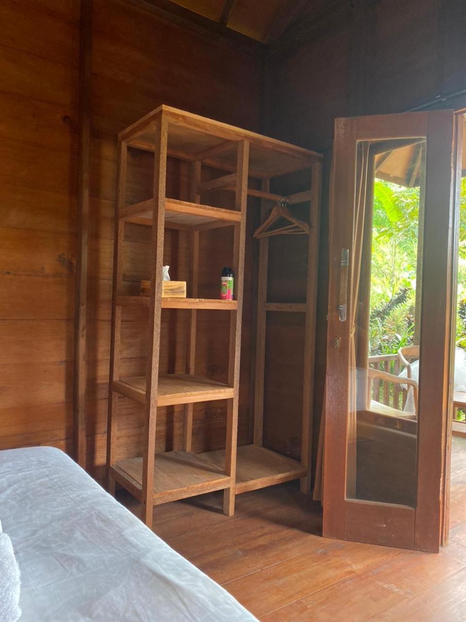 Uma D'Nyuh Homestay Singaraja Extérieur photo