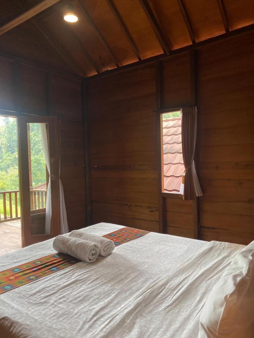 Uma D'Nyuh Homestay Singaraja Extérieur photo