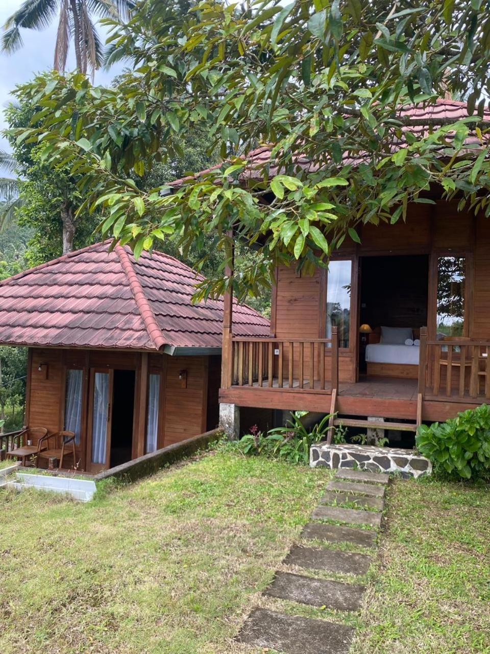Uma D'Nyuh Homestay Singaraja Extérieur photo