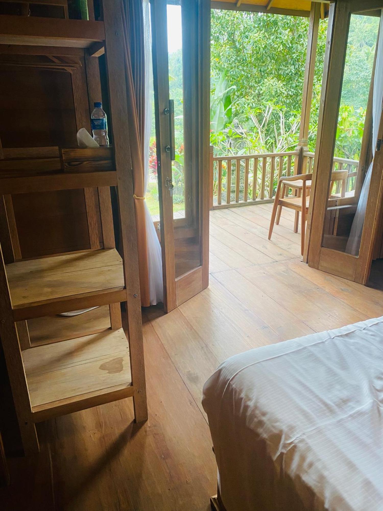 Uma D'Nyuh Homestay Singaraja Extérieur photo