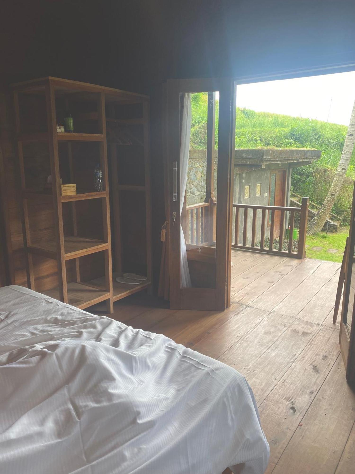 Uma D'Nyuh Homestay Singaraja Extérieur photo
